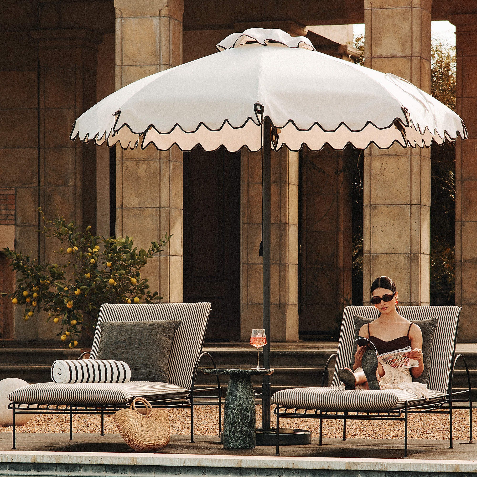 Costa Black Metal Outdoor Sun Lounger with Black and White Striped Sunbrella® Cushions